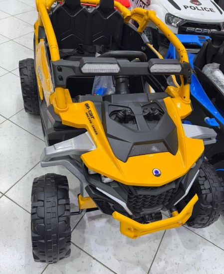 صورة سيارة أطفال كهربائية رياضية بنظام بلوتوث ومحركين – تصميم مغامرات